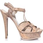 Pre-owned Tribute sandals in python